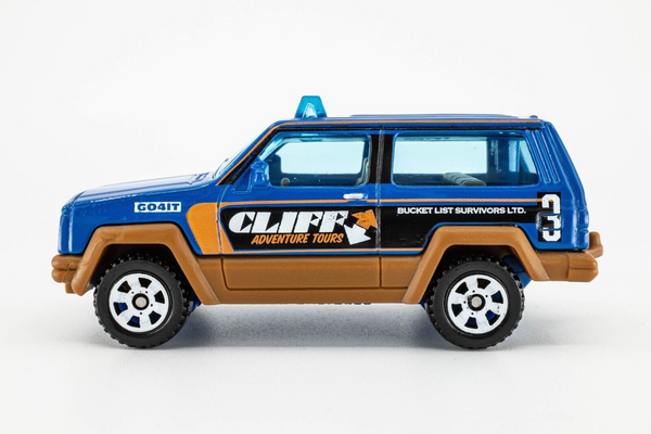 2020 Matchbox "Rocky Peaks" Jeep Cherokee BLUE | CLIFF ADVENTURE TOURS | MINT