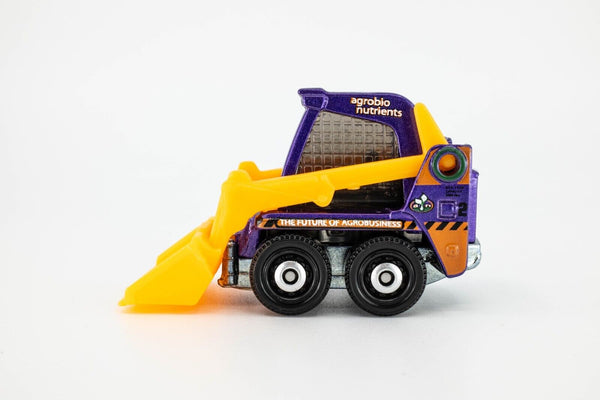 2020 Matchbox "MBX Construction II" Bobcat Skidster S100 PURPLE | AGROBIO | MINT